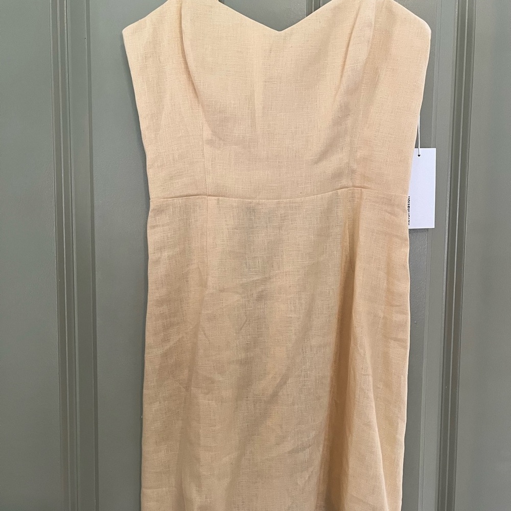 Reformation linen mini Dress NWT size 4, color Parmesan. It has spaghetti straps